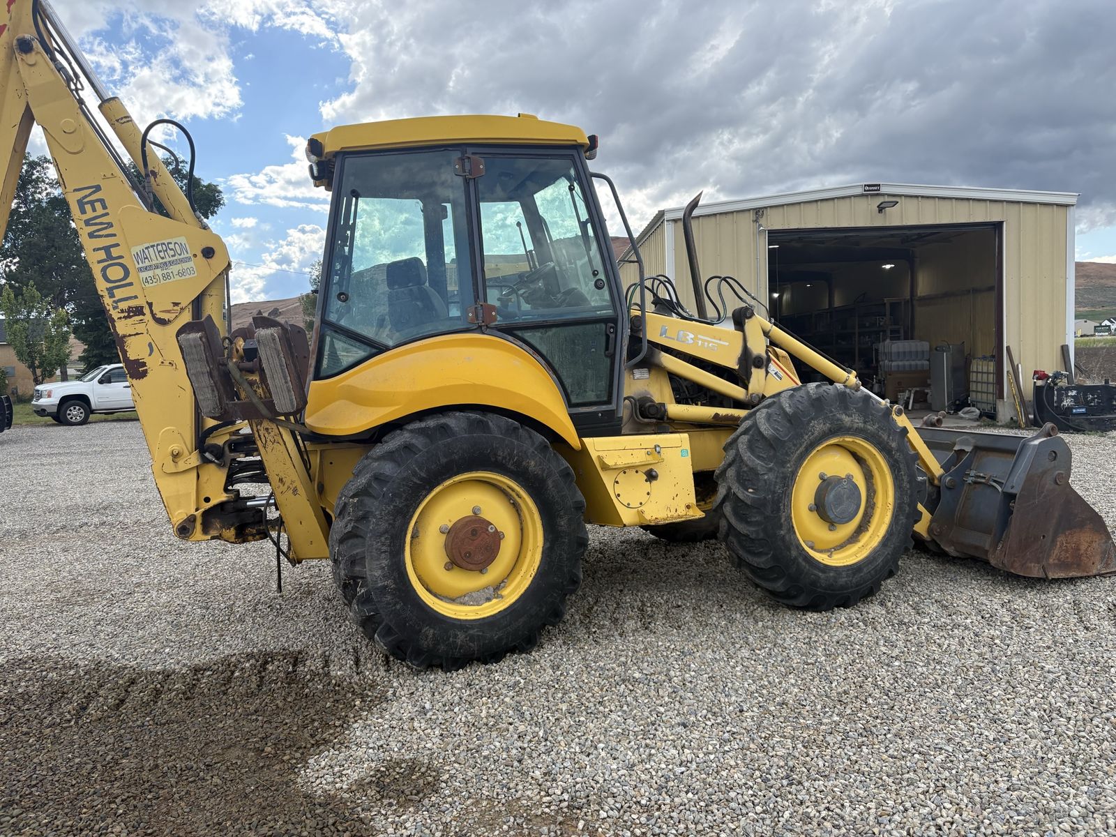 2002 new holland lb115 4x4 backhoe
