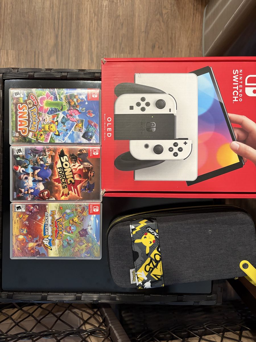Nintendo Switch OLED Console Bundle w/ 3 Games & Pikachu Carrying Case