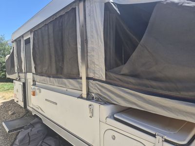 Westlake 2003 Pop-Up Camper Travel Trailer with Sink, Stove, and Dinette - Ready for Adventure!