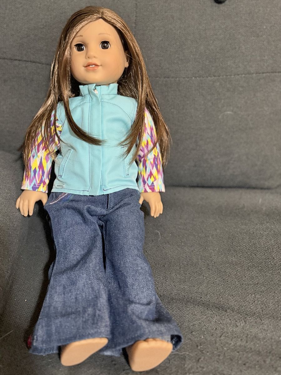 American Girl Doll with Brown Hair, Blue Vest, and Jeans
