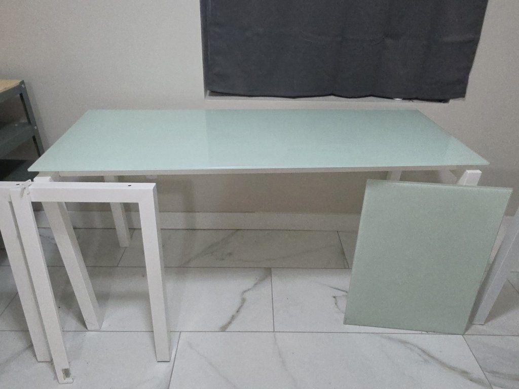 White Frame Glass Top office Table missing bolts for side attachment.