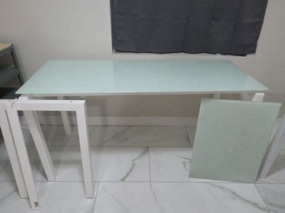 White Frame Glass Top office Table missing bolts for side attachment.
