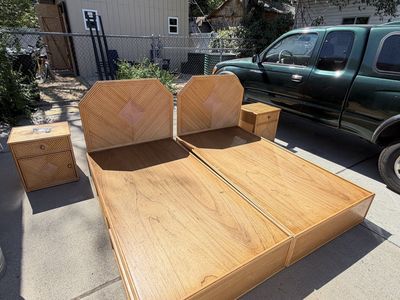 two twin bed frames with night stands and under bed storage