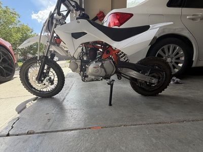 Kayo 90cc dirtbike perfect running. Will trade for a working yozma or and e-moto