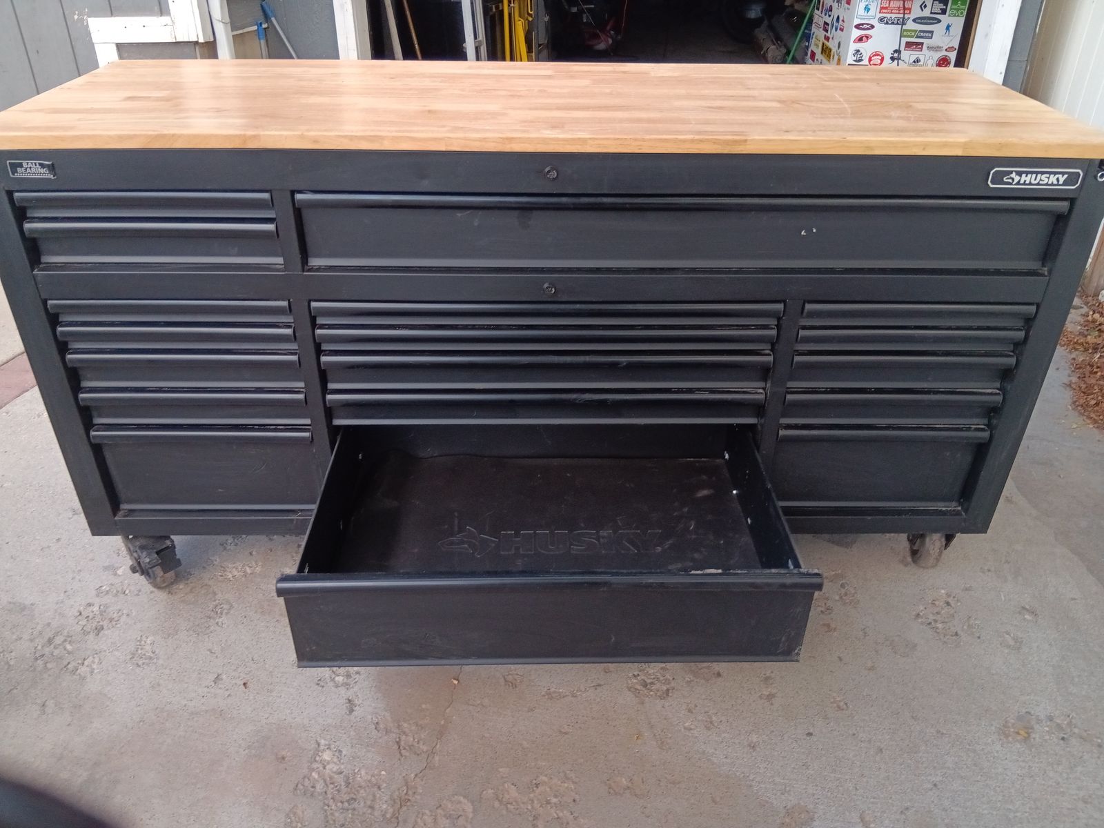 Husky Black Rolling Workbench with Wood Top and Power Strip
