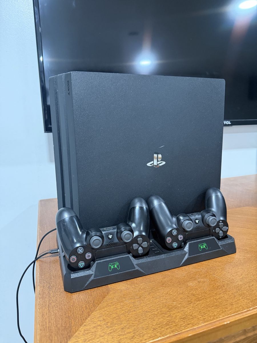 Sony PlayStation PS4 Pro 2.0 TB Bundle with 2 Controllers,Cooling Fan Dock, Steel series Headset.