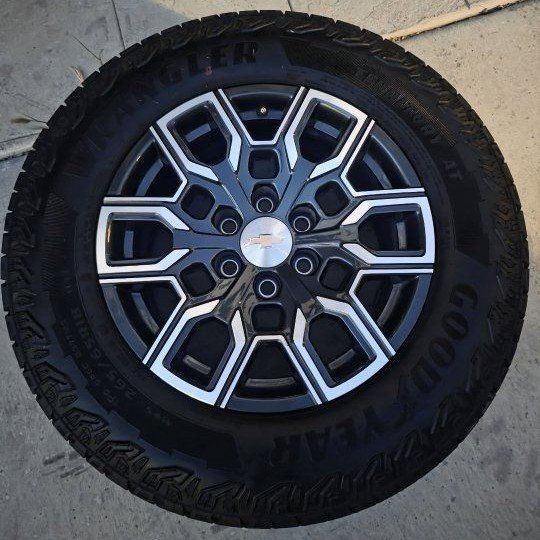 Chevy Silverado 18" OEM Wheel & Goodyear Wrangler Territory AT Tire 265/65R18