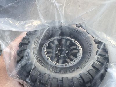 Brand New Traxxas 1.9 wheels/tires.
