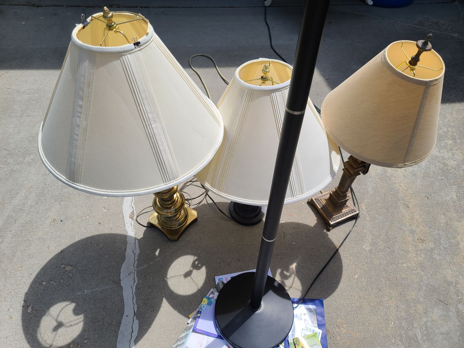 3 portable lamps with brass bases and beige lampshades. You can choose CFL or LED light bulbs