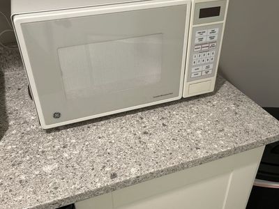 GE Countertop Microwave Oven - White - Turntable, Popcorn, Reheat, Auto Defrost