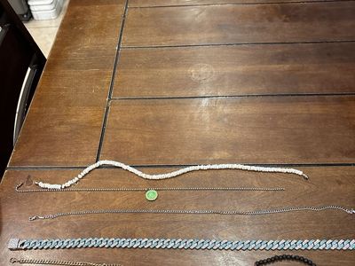Assorted Jewelry Lot: Necklaces, Bracelets, and Chains - Mixed Styles & Materials
