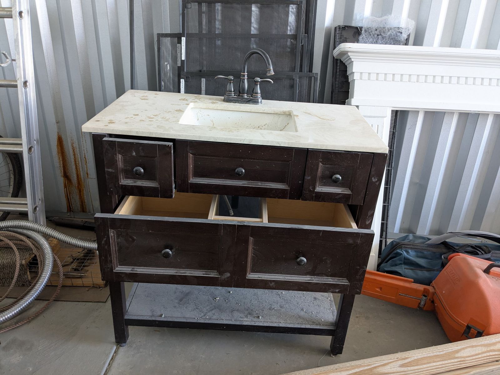Dark Wood Bathroom Vanity with Marble Top, Undermount Sink, and Faucet