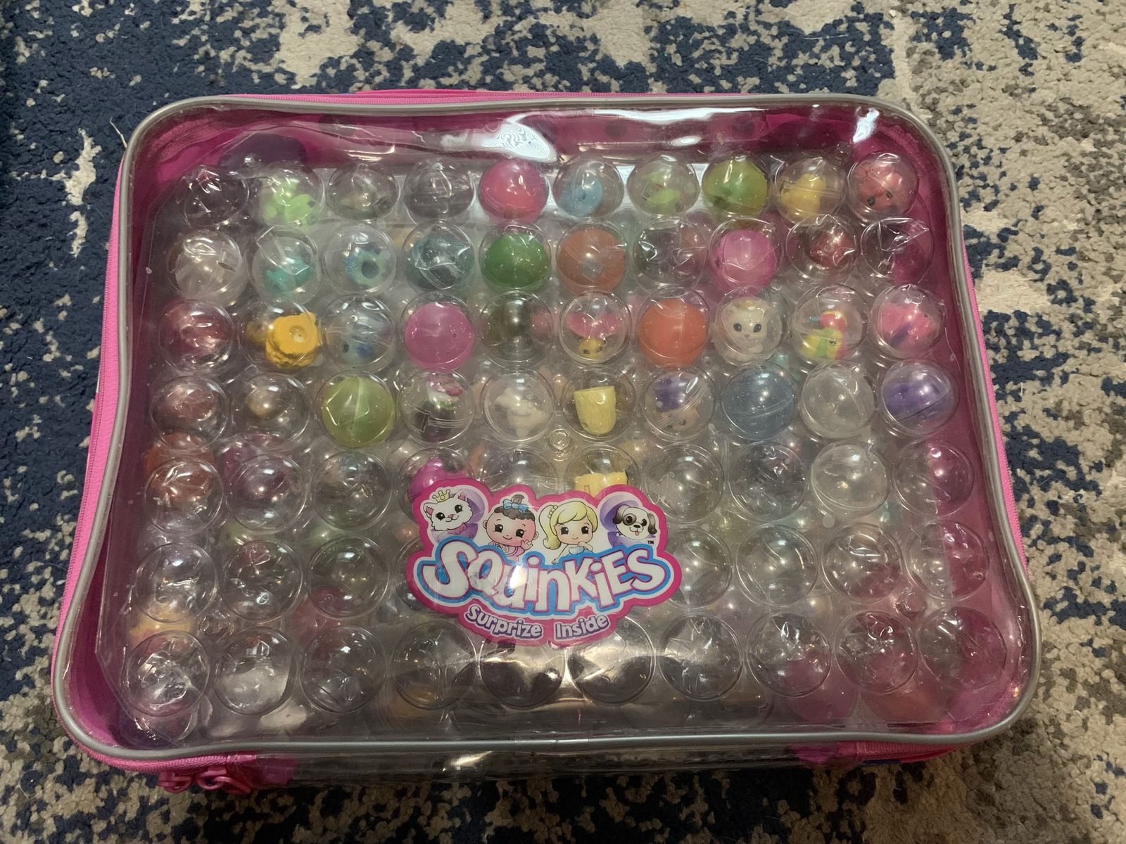 Squinkies Lot with Storage Case, Gumball Machine, Cupcake Playset, and Polar Plunge