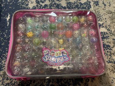 Squinkies Lot with Storage Case, Gumball Machine, Cupcake Playset, and Polar Plunge
