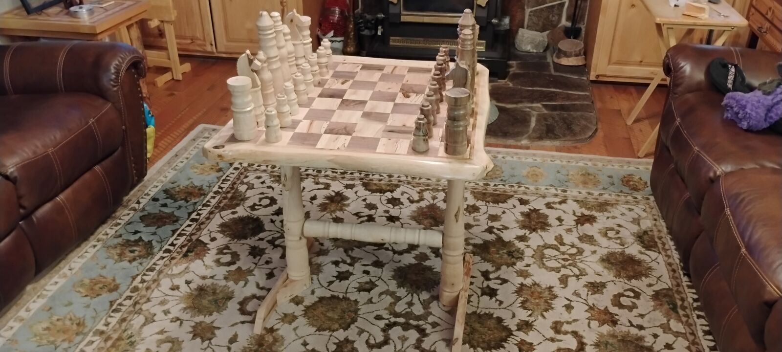 Hand made over size Chess Table with playing pieces.