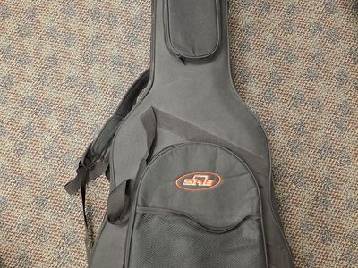 SKB Acoustic Guitar Hard Case with Soft Exterior - Black, Padded Interior, Backpack Straps