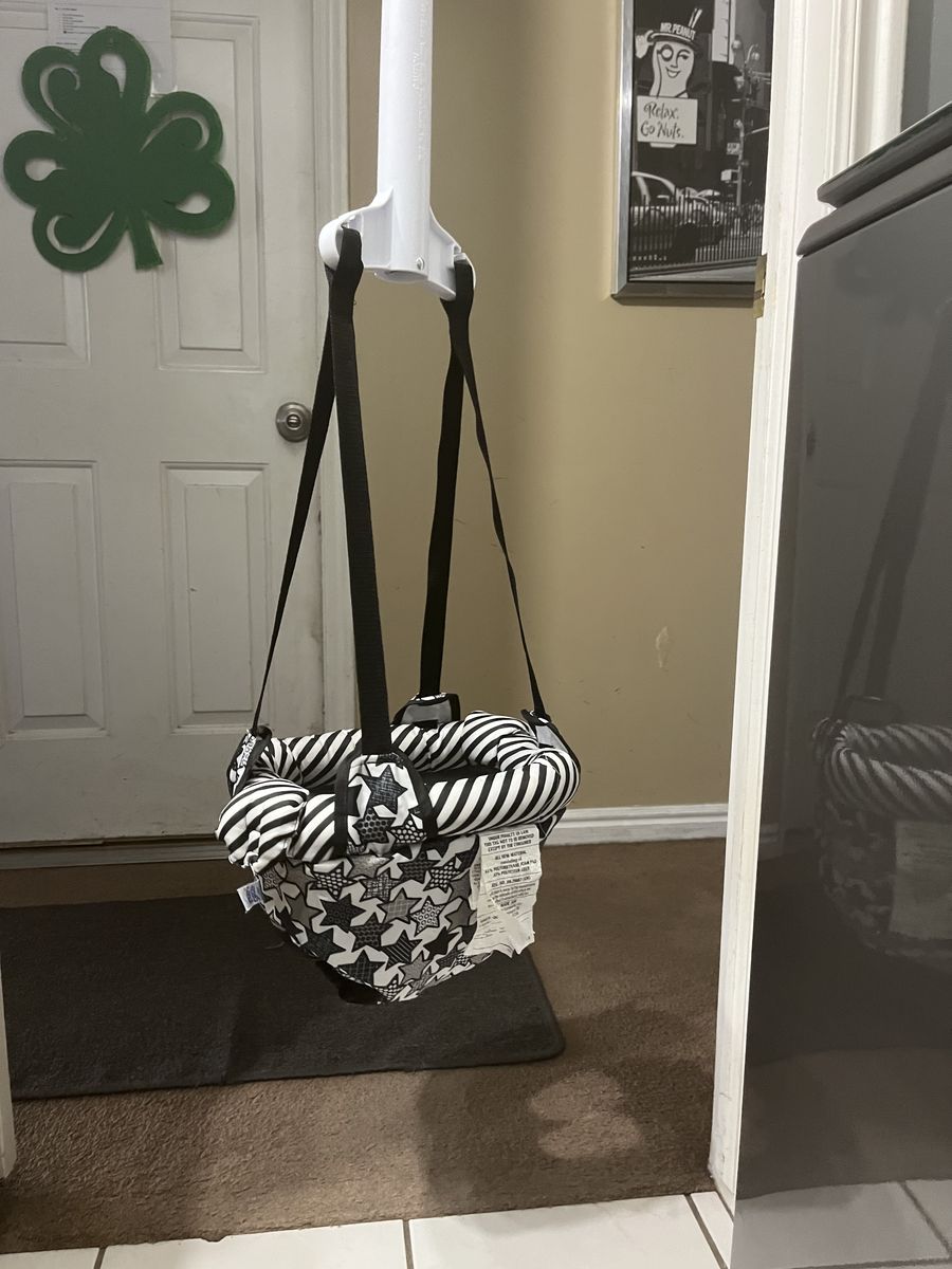 Baby ExerSaucer/ doorway bouncer