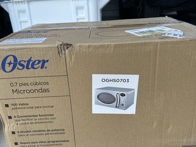 Oster OGHS0703 0.7 Cu. Ft. Countertop Microwave Oven 700W