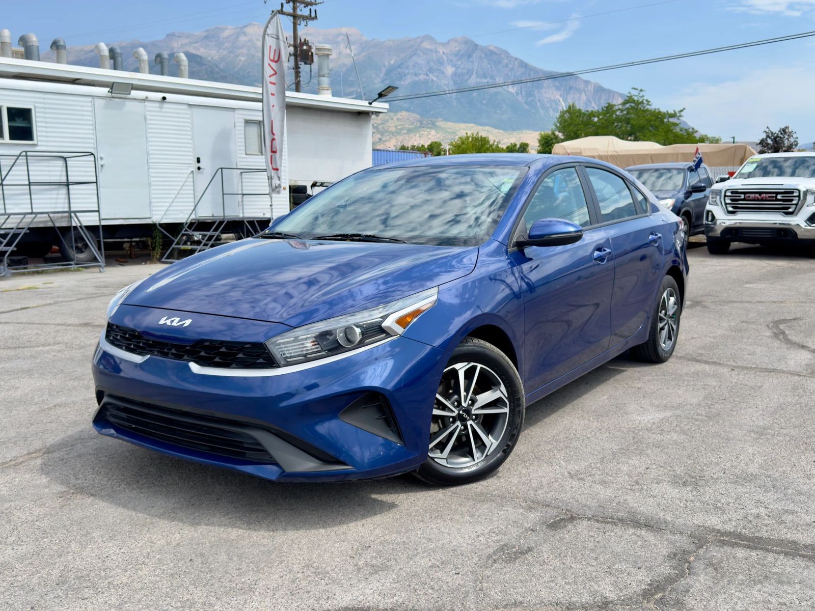 2023 Kia Forte LXS — rebuilt & branded title, 27% below market