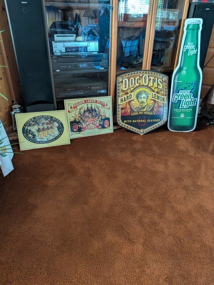 vintage beer signs and mirrors.