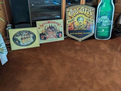 vintage beer signs and mirrors.