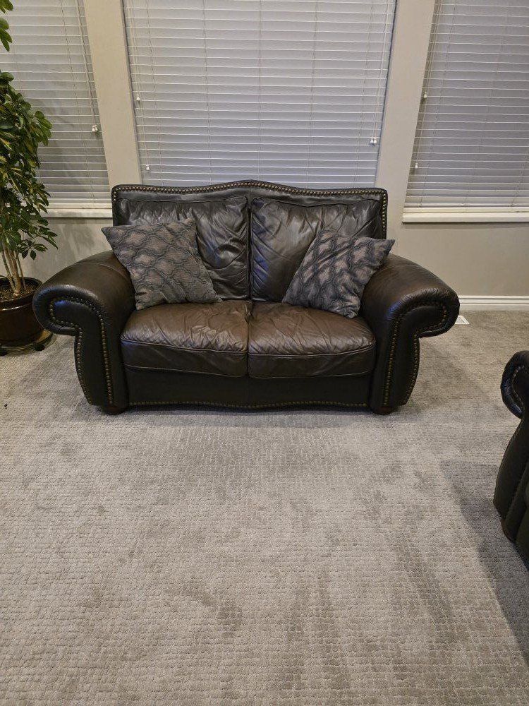 Real leather couch, love seat, and chair
