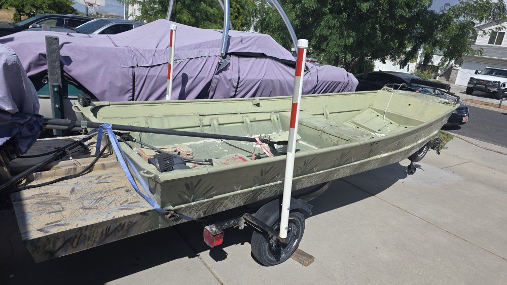 16x48 long tail duck boat and trailer