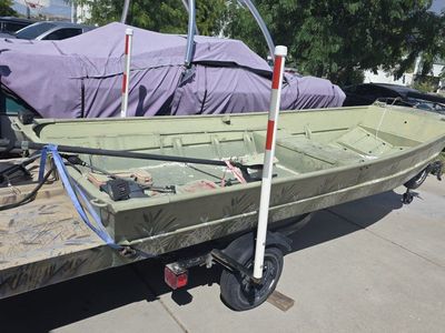 16x48 long tail duck boat and trailer