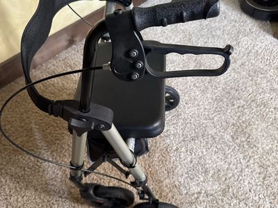 Soundfuse Folding Rollator Walker with Seat, Padded Backrest, and Storage Bag with wheels