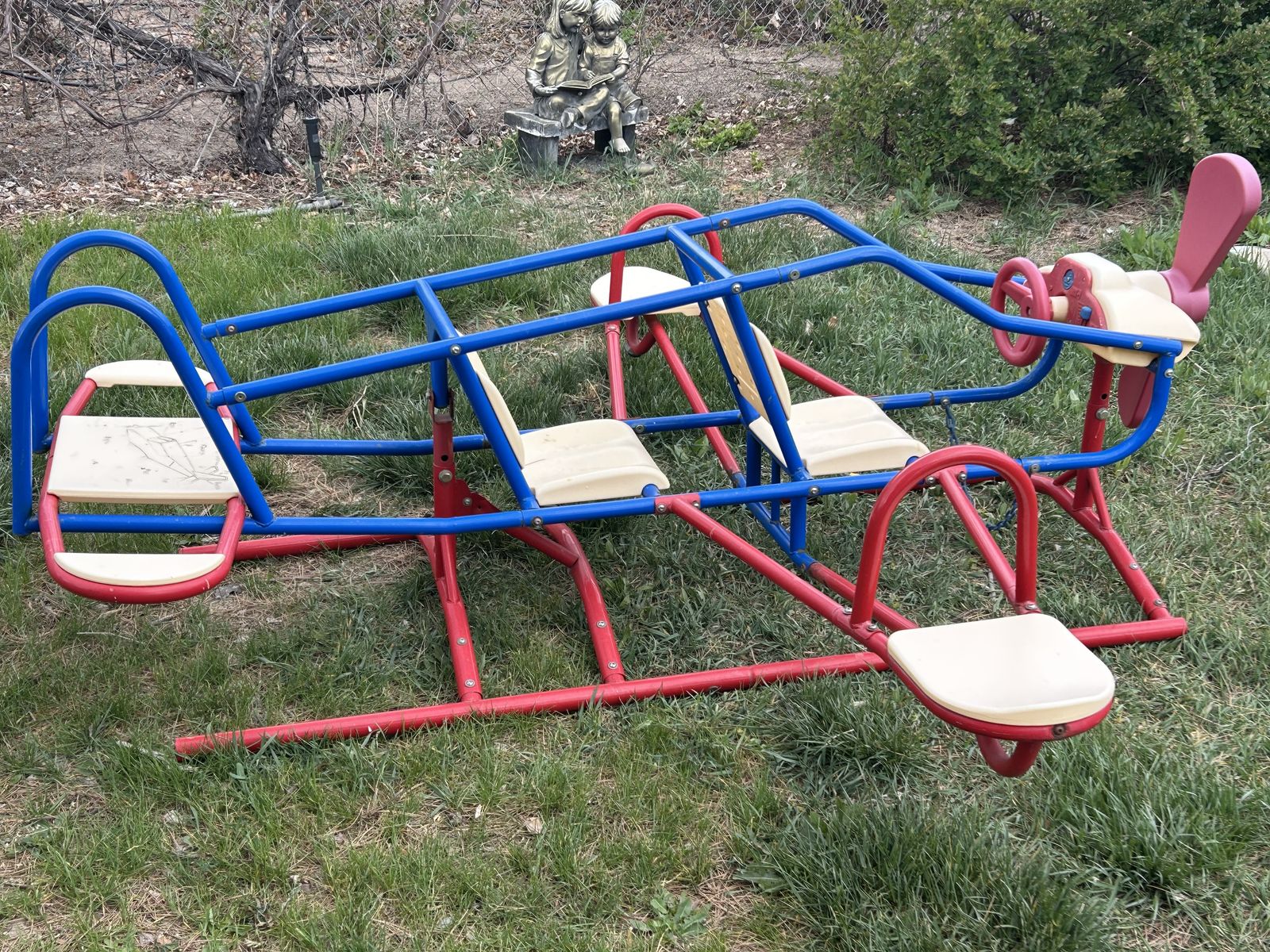 Playground airplane teeter totter