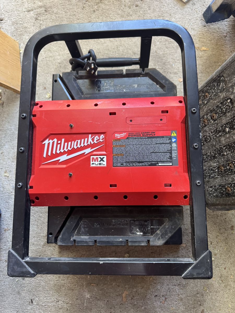 Milwaukee MX Fuel 3600W/1800W Carry-On Power Supply includes two batteries