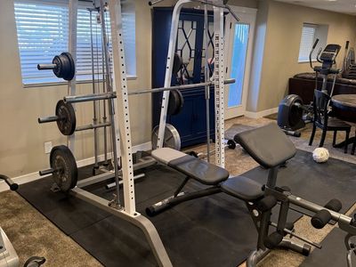 Smith machine, bench, weights, squat rack, cable pulls