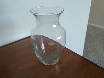 Clear vase about 8 inches tall