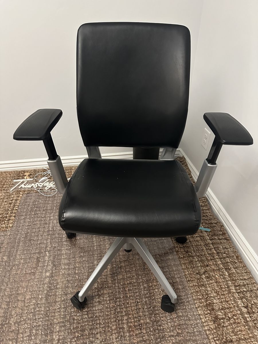 Black Executive Office Chair with Adjustable Arms & Rolling Base