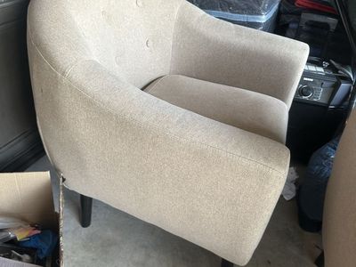Modern Beige Upholstered Armchair with Black Tapered Legs