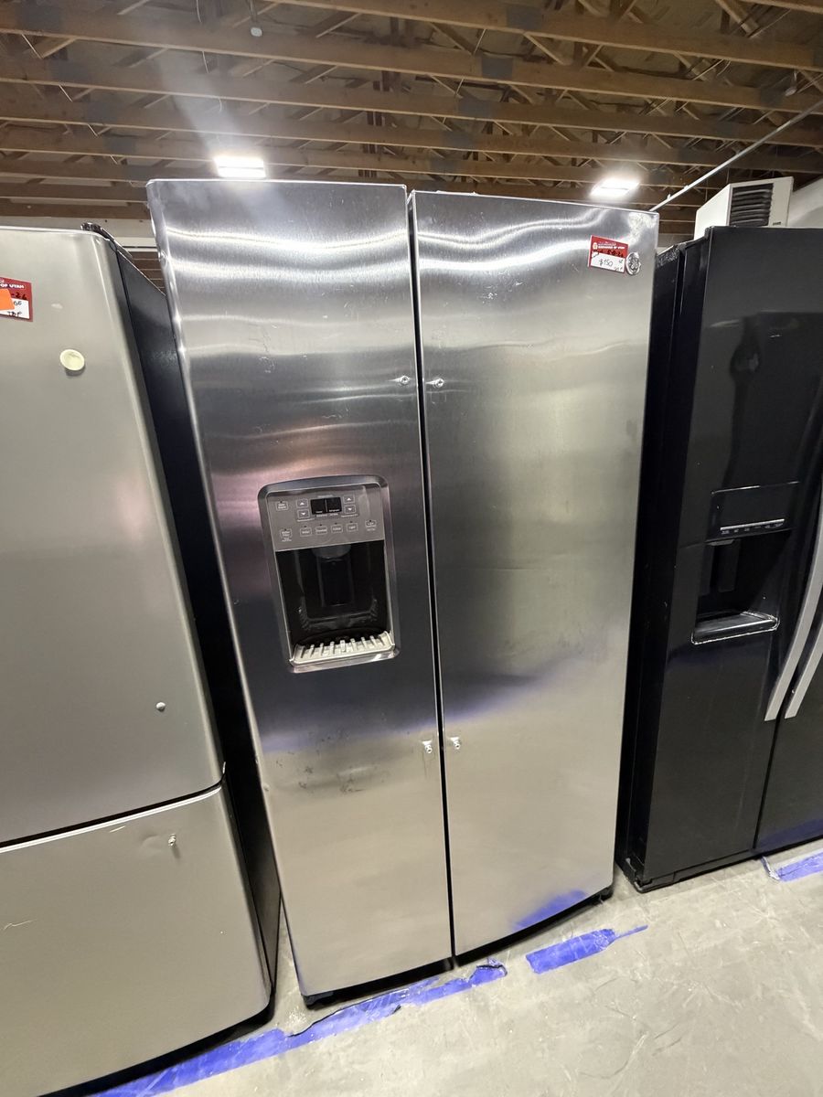 HUGE DEALS NOW! GOOD GE SIDE BY SIDE FRIDGE