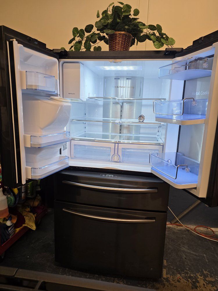 Black stainless Samsung refrigerator