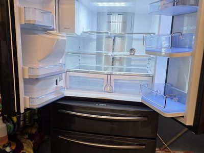 Black stainless Samsung refrigerator
