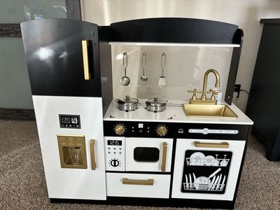 Kids Kitchen With Pans And Utensils