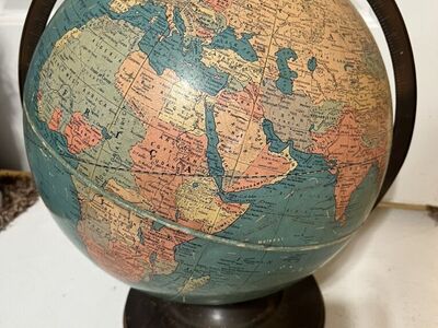 Old world spinning globe with metal stand