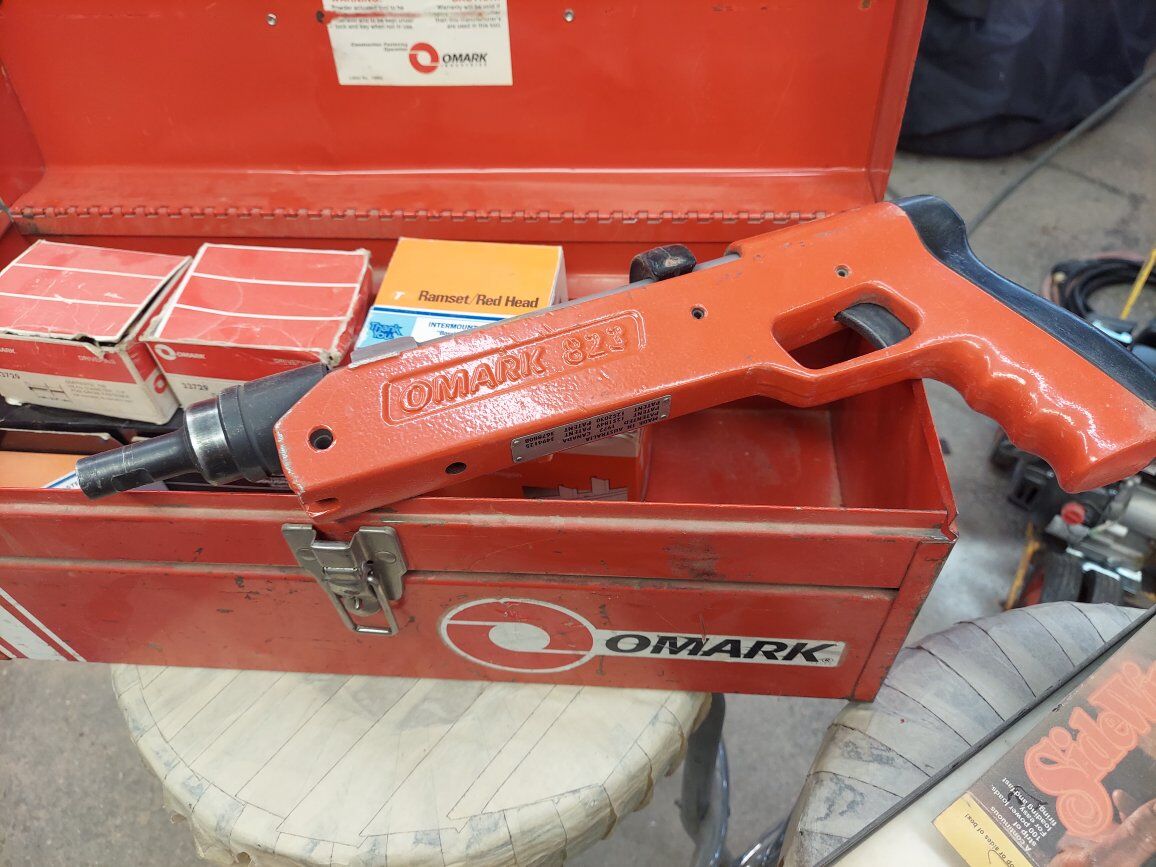 Omark 823 powder actuated nail gun