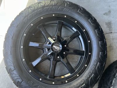 Moto Metal 20-inch Black Rims with Toyo Open Country A/T Tires (Need Replacement)