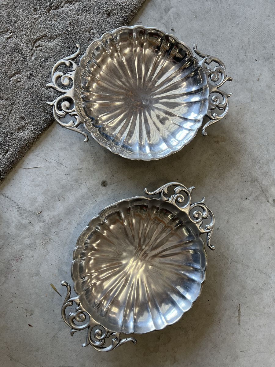 2 large heavy metal plates