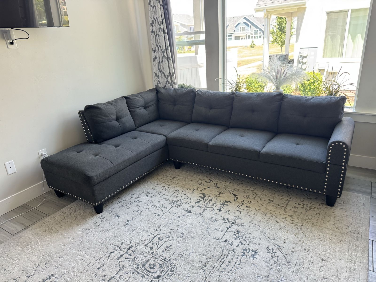 Spacious Dark Gray Sectional Sofa with Storage Chaise and Nailhead Trim - Excellent Condition