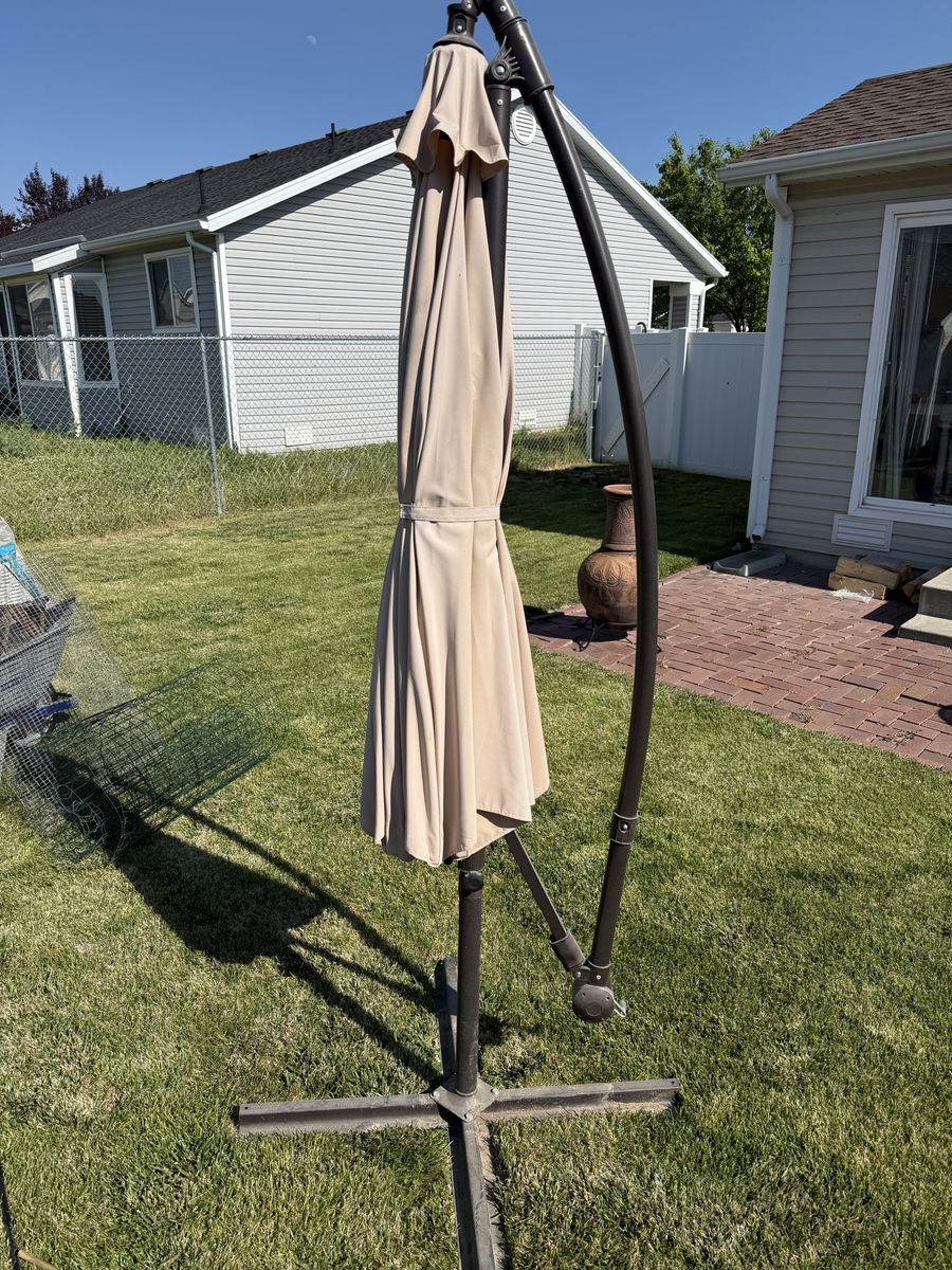 Cantilever Patio Umbrella - Tan/Beige with Offset Pole & Cross Base (Umbrella Fabric has some sun fading)