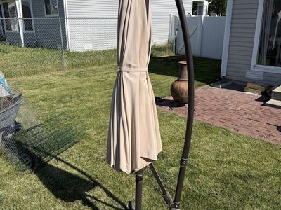 Cantilever Patio Umbrella - Tan/Beige with Offset Pole & Cross Base (Umbrella Fabric has some sun fading)