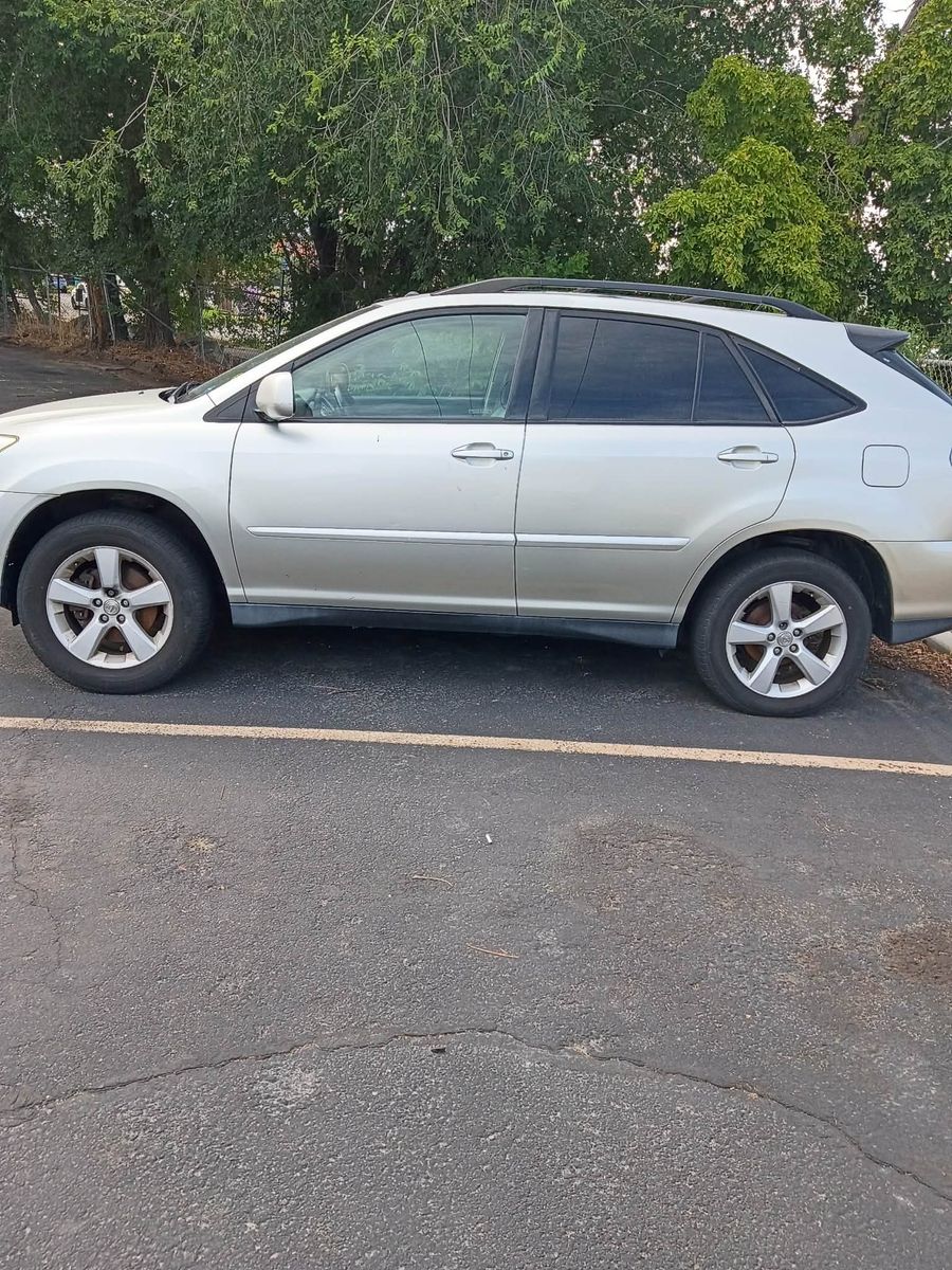 Silver Lexus RX SUV
