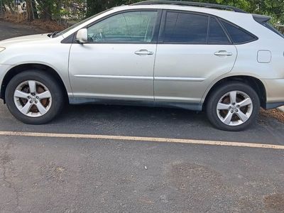 Silver Lexus RX SUV