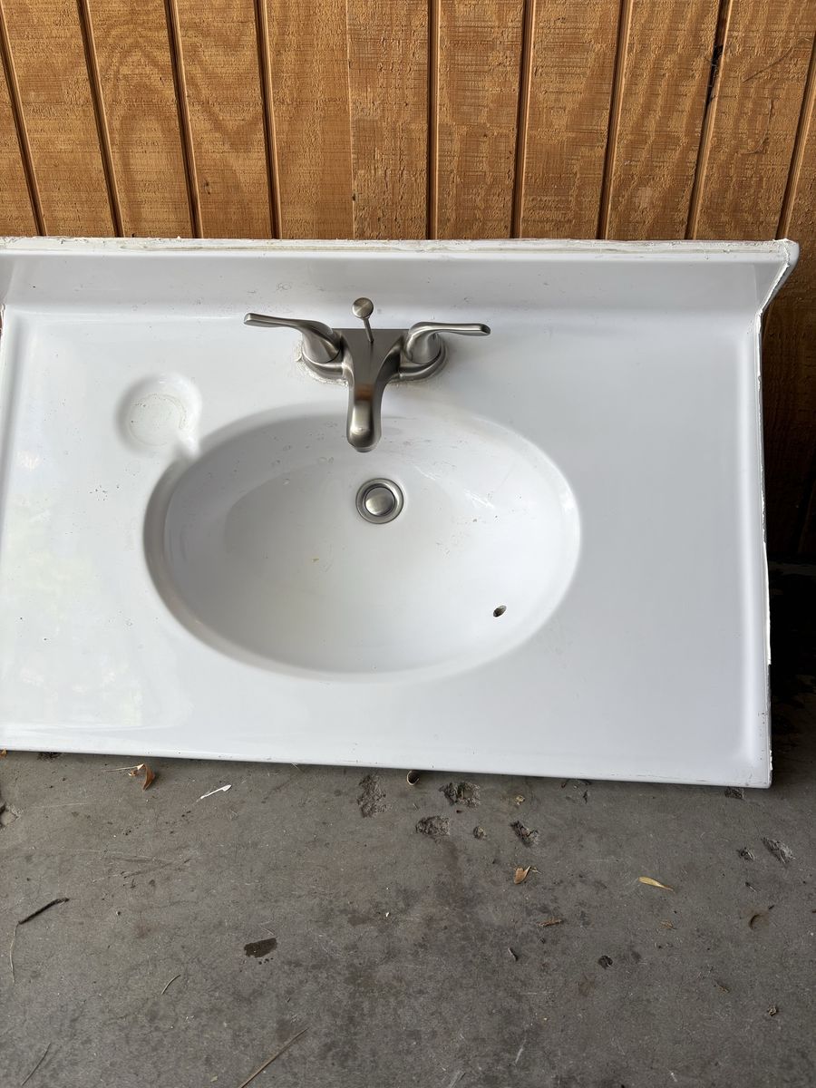 Vanity counter and sink with faucet