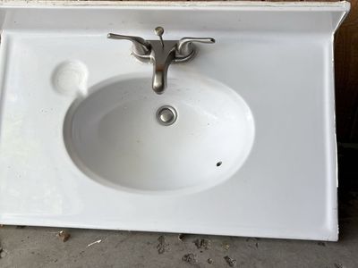 Vanity counter and sink with faucet